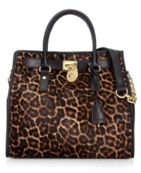 MICHAEL Michael Kors gives a classic tote design an edgy upgrade with leopard print haircalf, stud accents and signature hardware. But don't let this silhouette's luxe look fool you: it's roomy, pocket-trimmed interior perfects practical style. MICHAEL Michael Kors gives a classic tote design an edgy upgrade with leopard print haircalf, stud accents and signature hardware. But don't let this silhouette's luxe look fool you: it's roomy, pocket-trimmed interior perfects practical style.