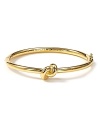 A sailor's knot bangle from kate spade new york conjures summers spent in Cape Cod cottages and East End estates.