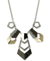 Industrial-strength fashion. This bib-style necklace from GUESS adds intrigue with both smooth and hammered pieces embellished with crystal accents. Crafted in imitation rhodium, shiny gold tone and hematite tone mixed metal. Approximate length: 18 inches + 2-inch extender. Approximate drop: 3 inches. Industrial-strength fashion. This bib-style necklace from GUESS adds intrigue with both smooth and hammered pieces embellished with crystal accents. Crafted in imitation rhodium, shiny gold tone and hematite tone mixed metal. Approximate length: 18 inches + 2-inch extender. Approximate drop: 3 inches.