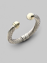 From the Thoroughbred Collection. An extra bold sterling silver cable becomes a striking hinged bangle, capped with domes of 14k gold. Sterling silver and 14k yellow gold Cable, 10mm Diameter, about 2¼ Made in USA From the Thoroughbred Collection. An extra bold sterling silver cable becomes a striking hinged bangle, capped with domes of 14k gold. Sterling silver and 14k yellow gold Cable, 10mm Diameter, about 2¼ Made in USA
