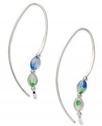 A sweep of color and a bit of polish. Jody Coyote's pretty loop earrings are crafted in sterling silver with silver and Czech glass accent beads in blue and green. Approximate drop: 1-1/2 inches. A sweep of color and a bit of polish. Jody Coyote's pretty loop earrings are crafted in sterling silver with silver and Czech glass accent beads in blue and green. Approximate drop: 1-1/2 inches.