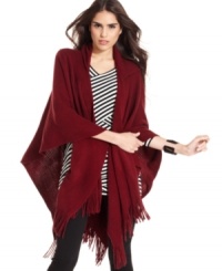 Casual style with an air of intrigue. Slip on this hooded ruana by Echo for a look that's all yours. Casual style with an air of intrigue. Slip on this hooded ruana by Echo for a look that's all yours.