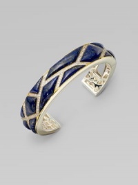 A narrow design in mother-of-pearl set in sterling silver with sparkling white sapphires accented with radiant 18k gold. Mother-of-pearlWhite sapphireSterling silver18K goldHinged closureDiameter, about 2¾Imported A narrow design in mother-of-pearl set in sterling silver with sparkling white sapphires accented with radiant 18k gold. Mother-of-pearlWhite sapphireSterling silver18K goldHinged closureDiameter, about 2¾Imported