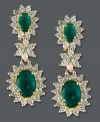 Don't be afraid to dazzle. Effy Collection's beautifully-crafted drop earrings incorporate oval-cut emeralds (2 ct. t.w.) and diamonds (7/8 ct. t.w.) in a polished, 14k gold post setting. Approximate drop length: 1 inch.