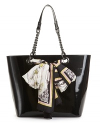 All wrapped up with a pretty bow: this basic yet bold shopper from DKNY is embellished with a flouncy silk star scarf that's removable in case it gets chilly. All wrapped up with a pretty bow: this basic yet bold shopper from DKNY is embellished with a flouncy silk star scarf that's removable in case it gets chilly.