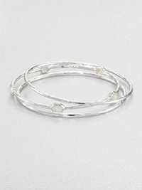 From the Rock Candy® Collection. A trio of hammered, sterling silver bangles accented with faceted mother-of-pearl. Sterling silverMother-of-pearlDiameter, about 2.5Slip-on styleImported From the Rock Candy® Collection. A trio of hammered, sterling silver bangles accented with faceted mother-of-pearl. Sterling silverMother-of-pearlDiameter, about 2.5Slip-on styleImported