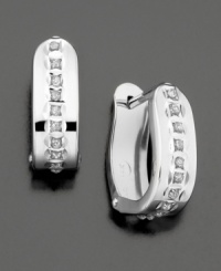 Pavé diamond accents and substantial shape lend traditional hoop earrings a modern edge. Pavé diamond accents and substantial shape lend traditional hoop earrings a modern edge.