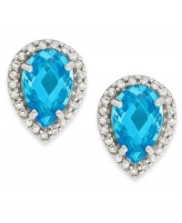 A true blue aesthetic. B. Brilliant's lovely teardrop-shaped stud earrings feature pear-cut London blue cubic zirconias (5 ct. t.w.) surrounded by round-cut white cubic zirconias. Post setting crafted in sterling silver. Approximate diameter: 1/2 inch. A true blue aesthetic. B. Brilliant's lovely teardrop-shaped stud earrings feature pear-cut London blue cubic zirconias (5 ct. t.w.) surrounded by round-cut white cubic zirconias. Post setting crafted in sterling silver. Approximate diameter: 1/2 inch.