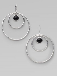 From the Scultura Collection. Double circles of polished sterling silver surround a center drop of smooth black onyx.Black onyx Sterling silver Diameter, about 2¼ Ear wire Imported