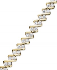 Exquisite shape and plenty of sparkle! Surprise her with this stunning tennis bracelet. A chic diagonal design with sparkling round-cut diamonds (1 ct. t.w.) will make quite the impact. Crafted in 10k gold. Approximate length: 7-1/2 inches. Exquisite shape and plenty of sparkle! Surprise her with this stunning tennis bracelet. A chic diagonal design with sparkling round-cut diamonds (1 ct. t.w.) will make quite the impact. Crafted in 10k gold. Approximate length: 7-1/2 inches.