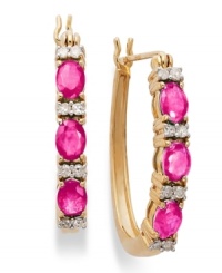 A color infusion. These 14k gold hoop earrings get a sparkling update with oval-cut rubies (1-1/5 ct. t.w.) and sparkling round-cut diamonds (1/8 ct. t.w.). Approximate diameter: 3/5 inch. A color infusion. These 14k gold hoop earrings get a sparkling update with oval-cut rubies (1-1/5 ct. t.w.) and sparkling round-cut diamonds (1/8 ct. t.w.). Approximate diameter: 3/5 inch.