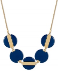 Feeling blue? Let this striking necklace cheer you up! Blue beaded circles create a unique effect on Kenneth Cole New York's frontal design. Set in gold tone mixed metal. Approximate length: 17 inches + 3-inch extender. Approximate drop: 1 inch. Feeling blue? Let this striking necklace cheer you up! Blue beaded circles create a unique effect on Kenneth Cole New York's frontal design. Set in gold tone mixed metal. Approximate length: 17 inches + 3-inch extender. Approximate drop: 1 inch.