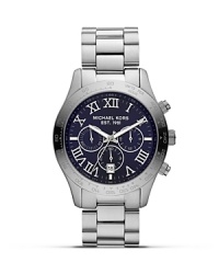Be a good sport with two-tone watch from MICHAEL Michael Kors, boasting a bold dial and sleek bracelet. Designed for performance and style, it's the ultimate in athletic cool. Be a good sport with two-tone watch from MICHAEL Michael Kors, boasting a bold dial and sleek bracelet. Designed for performance and style, it's the ultimate in athletic cool.