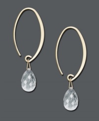 A simple hoop with an extra touch of sparkle. These elegant earrings feature a 14k gold setting with a faceted crystal teardrop. Approximate drop: 1-1/2 inches. A simple hoop with an extra touch of sparkle. These elegant earrings feature a 14k gold setting with a faceted crystal teardrop. Approximate drop: 1-1/2 inches.