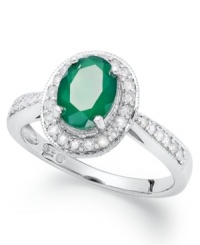 Make a sparkling impact with this pretty ring. Set in sterling silver, an oval-cut green agate (1-1/10 ct. t.w.) glows against a halo of round-cut diamonds (1/4 ct. t.w.). Size 7. Make a sparkling impact with this pretty ring. Set in sterling silver, an oval-cut green agate (1-1/10 ct. t.w.) glows against a halo of round-cut diamonds (1/4 ct. t.w.). Size 7.