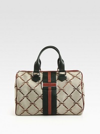 Iconic jacquard accented in supple two-tone leather.Double leather top handles, 6 dropTop zip closureOne inside zip pocketTwo inside open pocketsFully lined12½W X 8H X 7DImported Iconic jacquard accented in supple two-tone leather.Double leather top handles, 6 dropTop zip closureOne inside zip pocketTwo inside open pocketsFully lined12½W X 8H X 7DImported