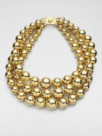 From the Modern Classics Collection. Three graduated strands of glowing golden beads create a look of flawless elegance in this striking design with a chunky turn-lock clasp.GoldtoneLength, about 20Turn-lock claspImported From the Modern Classics Collection. Three graduated strands of glowing golden beads create a look of flawless elegance in this striking design with a chunky turn-lock clasp.GoldtoneLength, about 20Turn-lock claspImported