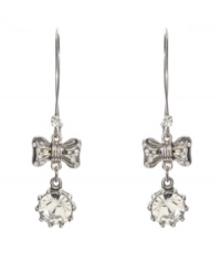 Get flirty, feminine style in an instant. Betsey Johnson's chic drop earrings feature a silver tone mixed metal setting with crystal-coated bows and circular glass stone drops. Approximate drop: 3 inches. Get flirty, feminine style in an instant. Betsey Johnson's chic drop earrings feature a silver tone mixed metal setting with crystal-coated bows and circular glass stone drops. Approximate drop: 3 inches.