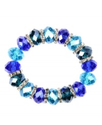 Drink in the cool blues! Captivating with tonal blue plastic beads, Nine West's stretch bracelet also boasts silver tone rondelles with clear crystal accents. Bracelet stretches to fit wrist. Crafted in imitation rhodium-plated mixed metal. Approximate diameter: 2 inches. Drink in the cool blues! Captivating with tonal blue plastic beads, Nine West's stretch bracelet also boasts silver tone rondelles with clear crystal accents. Bracelet stretches to fit wrist. Crafted in imitation rhodium-plated mixed metal. Approximate diameter: 2 inches.