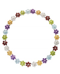 Petal perfection. Crafted in sterling silver, petite flowers adorn this pretty necklace. Crafted in sterling silver with pear-cut blue topaz (15 ct. t.w.), citrine (10-3/4 ct. t.w.), garnet (15 ct. t.w.), amethyst (10-3/4 ct. t.w.), peridot (13-1/5 ct. t.w.) and white topaz (15 ct. t.w.). Approximate length: 17-3/4 inches. Petal perfection. Crafted in sterling silver, petite flowers adorn this pretty necklace. Crafted in sterling silver with pear-cut blue topaz (15 ct. t.w.), citrine (10-3/4 ct. t.w.), garnet (15 ct. t.w.), amethyst (10-3/4 ct. t.w.), peridot (13-1/5 ct. t.w.) and white topaz (15 ct. t.w.). Approximate length: 17-3/4 inches.
