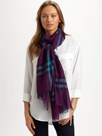 Classic mega check pattern on semi-lustrous wool/silk with fringe trim. Wool/silk 28 X 86 Dry clean Made in Italy Classic mega check pattern on semi-lustrous wool/silk with fringe trim. Wool/silk 28 X 86 Dry clean Made in Italy