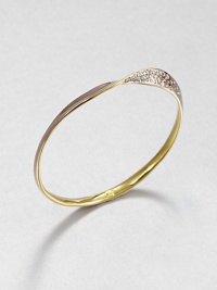 From the Miss Havisham Collection. A slender twisted bangle of polished rose goldtone glows and shimmers with Swarovski crystals.CrystalRose goldtoneDiameter, about 2.25Width, about .25Imported From the Miss Havisham Collection. A slender twisted bangle of polished rose goldtone glows and shimmers with Swarovski crystals.CrystalRose goldtoneDiameter, about 2.25Width, about .25Imported