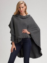 Beautifully draped merino/angora knit with elegant ruffle trim. About 42 X 54 Merino/angora; dry clean Made in Scotland Beautifully draped merino/angora knit with elegant ruffle trim. About 42 X 54 Merino/angora; dry clean Made in Scotland