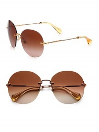Timeless sunglasses in a retro rimless design with requisite logo temples. Available in bronze with brown gradient lens or black with grey gradient lens.Gold-tone metal logo templesUV400 protectionMade in Italy Timeless sunglasses in a retro rimless design with requisite logo temples. Available in bronze with brown gradient lens or black with grey gradient lens.Gold-tone metal logo templesUV400 protectionMade in Italy