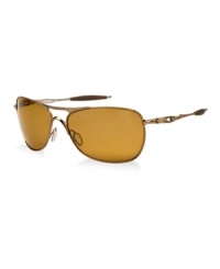 This flashback flows with fluid contours that put a fresh spin on a classic teardrop shape. Sculptural detailing lays down distinction in a durable frame of lightweight C-5 alloy. This is how yesteryear hits the forefront of style, and the vintage flavor is seasoned with premium optical technologies. Unobtainium® components keep a grip on comfort. This brown chrome look has bronze, polarized lenses. This flashback flows with fluid contours that put a fresh spin on a classic teardrop shape. Sculptural detailing lays down distinction in a durable frame of lightweight C-5 alloy. This is how yesteryear hits the forefront of style, and the vintage flavor is seasoned with premium optical technologies. Unobtainium® components keep a grip on comfort. This brown chrome look has bronze, polarized lenses.