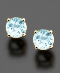 Brilliantly faceted round-cut aquamarine (5 mm) sparkles luminously in these simple yet elegant stud earrings. Set in 14k gold. Brilliantly faceted round-cut aquamarine (5 mm) sparkles luminously in these simple yet elegant stud earrings. Set in 14k gold.