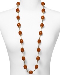 RJ Graziano channels '40s chic with this heirloom-haute beaded necklace. Egg-shaped caramel beads capped with gold tone hardware blend elegantly with a range of looks. RJ Graziano channels '40s chic with this heirloom-haute beaded necklace. Egg-shaped caramel beads capped with gold tone hardware blend elegantly with a range of looks.