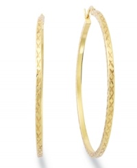 Classic chic. Every girl needs a polished pair of hoops like this traditional Giani Bernini style. Crafted in 24k gold over sterling silver with a unique textured surface. Approximate diameter: 2 inches. Approximate width: 1/10 inch. Classic chic. Every girl needs a polished pair of hoops like this traditional Giani Bernini style. Crafted in 24k gold over sterling silver with a unique textured surface. Approximate diameter: 2 inches. Approximate width: 1/10 inch.