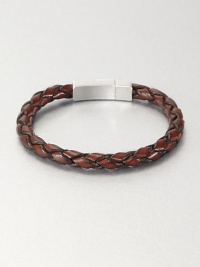 Braided brown Italian leather band with sterling silver clasp. Tension-held box clasp About 8½ long Embossed signature Made in United Kingdom Braided brown Italian leather band with sterling silver clasp. Tension-held box clasp About 8½ long Embossed signature Made in United Kingdom