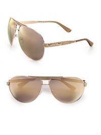 Get a touch of the wild with this sleek metal frame. Available in rose gold with grey/bronze mirror lens. Logo temples100% UV protectionMade in Italy Get a touch of the wild with this sleek metal frame. Available in rose gold with grey/bronze mirror lens. Logo temples100% UV protectionMade in Italy