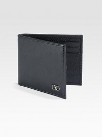 Single fold wallet rendered in luxuriously textured, Italian calfskin leather with double gancini silver ornament accent for a signature finish.One bill compartmentSix card slotsLeather4W x 3HMade in Italy Single fold wallet rendered in luxuriously textured, Italian calfskin leather with double gancini silver ornament accent for a signature finish.One bill compartmentSix card slotsLeather4W x 3HMade in Italy