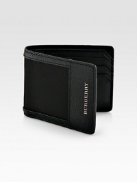 Carry your cards and cash in style with this masculine, yet modern hipfold design rendered in a sturdy nylon with signature leather trim and detail.One billfold compartmentSix card slots94% polyamide/6% acrylic3W x 4HImported Carry your cards and cash in style with this masculine, yet modern hipfold design rendered in a sturdy nylon with signature leather trim and detail.One billfold compartmentSix card slots94% polyamide/6% acrylic3W x 4HImported