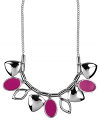 A colorful infusion. Nine West's pretty necklace features leaf-shaped charms and fuchsia enamel ovals for a bright pop of color. Set in silver tone mixed metal. Approximate length: 16 inches + 2-inch extender. Approximate drop length: 1 inch. Approximate drop width: 5-3/4 inches. A colorful infusion. Nine West's pretty necklace features leaf-shaped charms and fuchsia enamel ovals for a bright pop of color. Set in silver tone mixed metal. Approximate length: 16 inches + 2-inch extender. Approximate drop length: 1 inch. Approximate drop width: 5-3/4 inches.