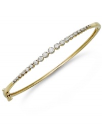 Red carpet-ready style. Round-cut diamonds (1/2 ct. t.w.) take center stage on YellOra™'s luminous bangle. Precious metal made from a combination of pure gold, sterling silver and palladium. Approximate diameter: 2-1/2 inches. Red carpet-ready style. Round-cut diamonds (1/2 ct. t.w.) take center stage on YellOra™'s luminous bangle. Precious metal made from a combination of pure gold, sterling silver and palladium. Approximate diameter: 2-1/2 inches.