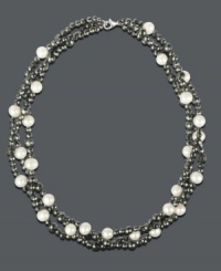 Luxury in layers. This chic, three strand necklace highlights white and grey cultured freshwater pearls (6-7 mm), sparkling hematite beads (264-3/4 ct. t.w.) and a polished sterling silver setting. Approximate length: 17 inches. Luxury in layers. This chic, three strand necklace highlights white and grey cultured freshwater pearls (6-7 mm), sparkling hematite beads (264-3/4 ct. t.w.) and a polished sterling silver setting. Approximate length: 17 inches.