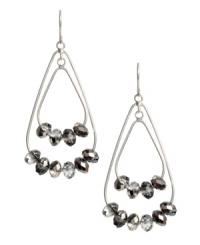 Nothing says stylish more than bold, statement earrings. Kenenth Cole New York design features double teardrops decorated with glittering glass beads set in silver tone mixed metal. Approximate drop: 1-3/4 inches. Nothing says stylish more than bold, statement earrings. Kenenth Cole New York design features double teardrops decorated with glittering glass beads set in silver tone mixed metal. Approximate drop: 1-3/4 inches.