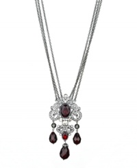 Spectacular style. T Tahari's Crystal Elegance Collection showcases majestic design, as exemplified by this faceted red crystal three strand necklace. Crafted in hematite tone mixed metal, it's enhanced by sparkling black crystal accents. Nickel free for sensitive skin. Approximate length: 32 inches + 4-inch extender. Approximate drop: 4 inches. Spectacular style. T Tahari's Crystal Elegance Collection showcases majestic design, as exemplified by this faceted red crystal three strand necklace. Crafted in hematite tone mixed metal, it's enhanced by sparkling black crystal accents. Nickel free for sensitive skin. Approximate length: 32 inches + 4-inch extender. Approximate drop: 4 inches.