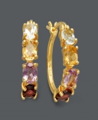 Introduce new color to your wardrobe with these clever hoops. Victoria Townsend earrings feature oval-cut amethyst (9/10 ct. t.w.), blue topaz (1-1/10 ct. t.w.), garnet (1-1/10 ct. t.w.) and citrine (9/10 ct. t.w.) in an 18k gold over sterling silver setting. Approximate diameter: 1 inch. Introduce new color to your wardrobe with these clever hoops. Victoria Townsend earrings feature oval-cut amethyst (9/10 ct. t.w.), blue topaz (1-1/10 ct. t.w.), garnet (1-1/10 ct. t.w.) and citrine (9/10 ct. t.w.) in an 18k gold over sterling silver setting. Approximate diameter: 1 inch.
