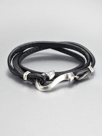 From the Dayak Collection. A strand of rich black leather wraps around the wrist, then closes with a bold sterling silver hook for a look of street-smart elegance.LeatherSterling silverStrap width, about .5Diameter, about 2.5Hook-and-loop closureMade in Bali From the Dayak Collection. A strand of rich black leather wraps around the wrist, then closes with a bold sterling silver hook for a look of street-smart elegance.LeatherSterling silverStrap width, about .5Diameter, about 2.5Hook-and-loop closureMade in Bali