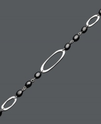 Decorate your wrist with the perfect finishing touch. This chic bracelet features a cut-out oval design accented by onyx beads (6 mm x 4 mm). Set in sterling silver. Approximate length: 7 inches. Decorate your wrist with the perfect finishing touch. This chic bracelet features a cut-out oval design accented by onyx beads (6 mm x 4 mm). Set in sterling silver. Approximate length: 7 inches.