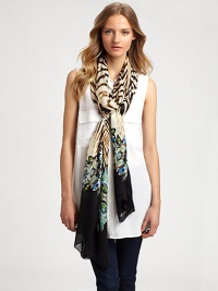 A dramatic zebra print is accented by colorful crystals on this posh silk wrap.SilkAbout 28 X 110Dry cleanMade in Italy