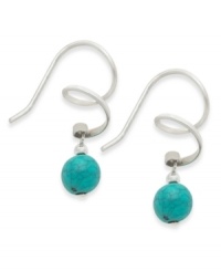 Fun style with colorful flair. Jody Coyote's unique swirl drop earrings are crafted in sterling silver with a colorful turquoise bead (6 mm). Approximate drop: 1 inch. Fun style with colorful flair. Jody Coyote's unique swirl drop earrings are crafted in sterling silver with a colorful turquoise bead (6 mm). Approximate drop: 1 inch.