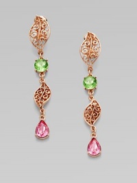 A delicate link design with pretty filigree leaves and sparking rhinestones. Glass stonesRose goldtone brass and pewterDrop, about 4Clip-on backMade in USA A delicate link design with pretty filigree leaves and sparking rhinestones. Glass stonesRose goldtone brass and pewterDrop, about 4Clip-on backMade in USA