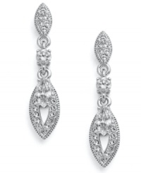 Light as a feather. Eliot Danori's stunning earrings feature an elongated feather shape decorated by sparkling crystals and cubic zirconia (1/2 ct. t.w.). Set in rhodium-plated mixed metal. Approximate drop: 3/4 inch. Light as a feather. Eliot Danori's stunning earrings feature an elongated feather shape decorated by sparkling crystals and cubic zirconia (1/2 ct. t.w.). Set in rhodium-plated mixed metal. Approximate drop: 3/4 inch.