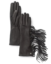 Fabulously fringed and lined in cashmere, these buttery leather gloves from MICHAEL Michael Kors blend chic sophistication with bold biker style. Fabulously fringed and lined in cashmere, these buttery leather gloves from MICHAEL Michael Kors blend chic sophistication with bold biker style.