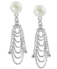 A lace look lends a stylish touch to these drop earrings. Crafted from sterling silver with a rhodium finish, the pair evokes elegance with cultured freshwater pearls (8-8-1/2 mm). Approximate drop length: 1-1/2 inches. Approximate drop width: 3/8 inch. A lace look lends a stylish touch to these drop earrings. Crafted from sterling silver with a rhodium finish, the pair evokes elegance with cultured freshwater pearls (8-8-1/2 mm). Approximate drop length: 1-1/2 inches. Approximate drop width: 3/8 inch.